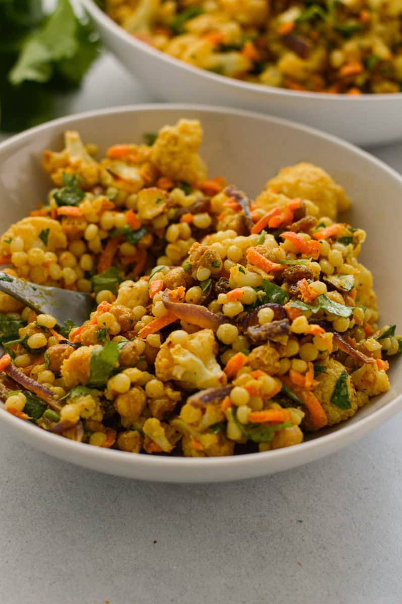 close up of curried couscous vegan salad