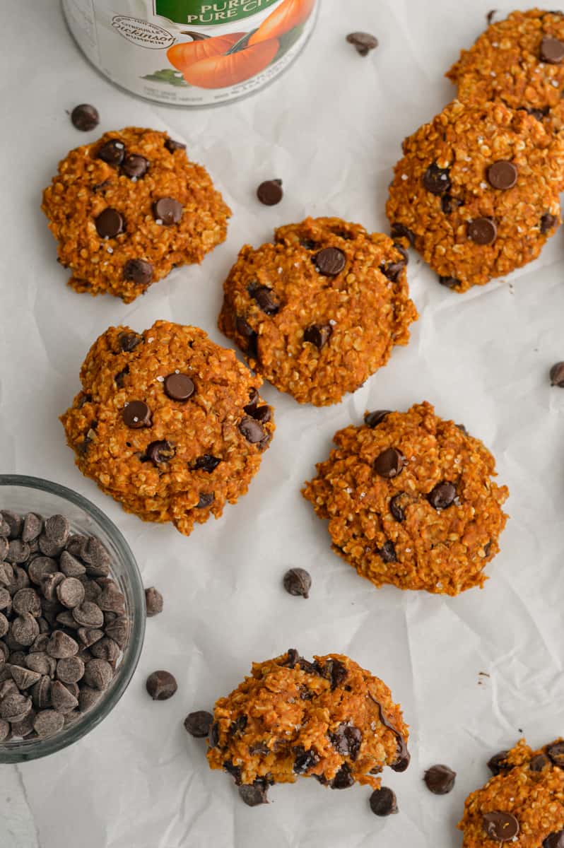 Birds eye view of gluten free pumpkin oatmeal cookies with chocolate chips scattered.