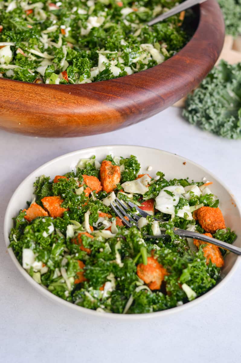 Serving a bowl of chick-fil-a kale salad.