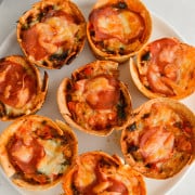 Plate with pizza cups.
