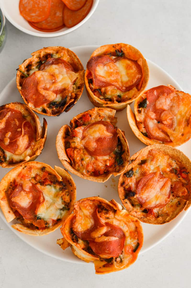 Plate with pizza cups.