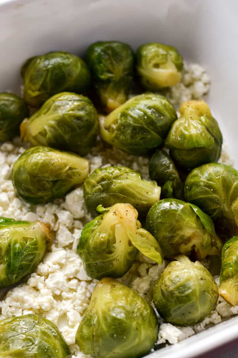 Brussels sprouts on top of feta.