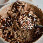 Chocolate greek yogurt bowl with a cracked peppermint chocolate magic shell.