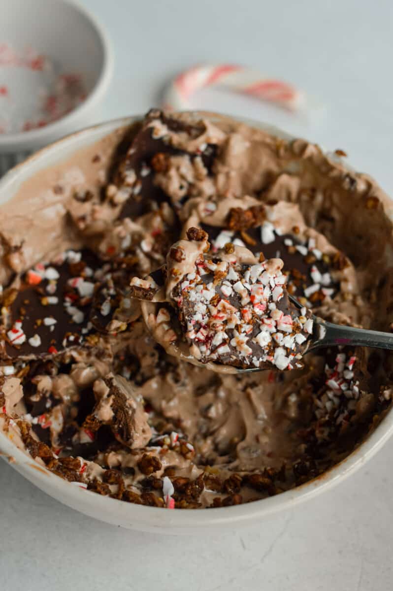 Chocolate greek yogurt bowl with a cracked peppermint chocolate magic shell.