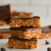 Stack of 3 chocolate peanut butter rice krispie squares.