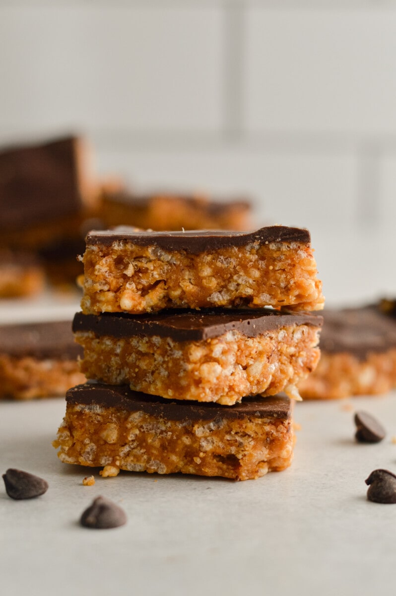 Stack of 3 chocolate peanut butter rice krispie squares.
