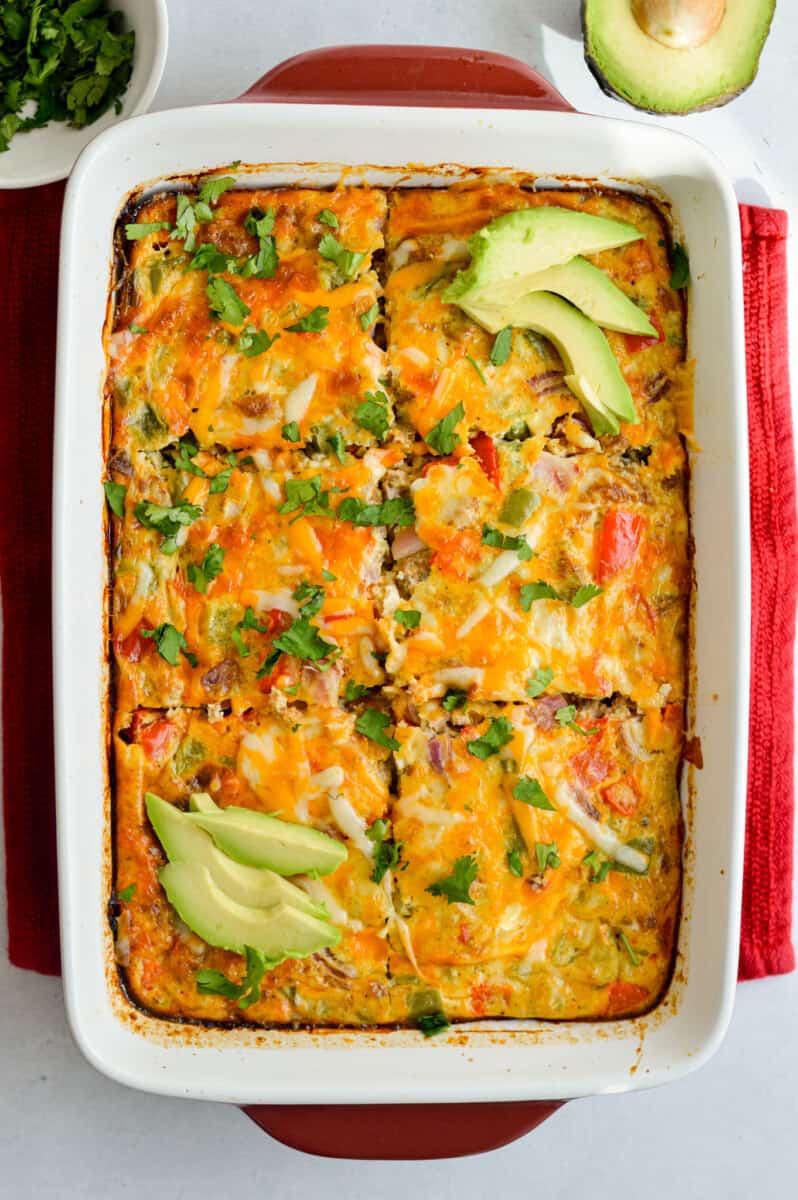 Birds eye of chorizo, egg & green chili breakfast casserole topped with avocado slices.