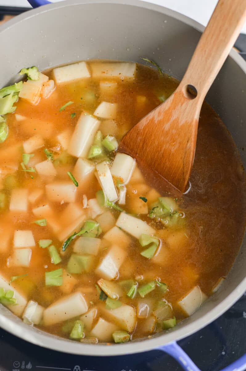 Cooking veggies and potatoes in vegetable broth.
