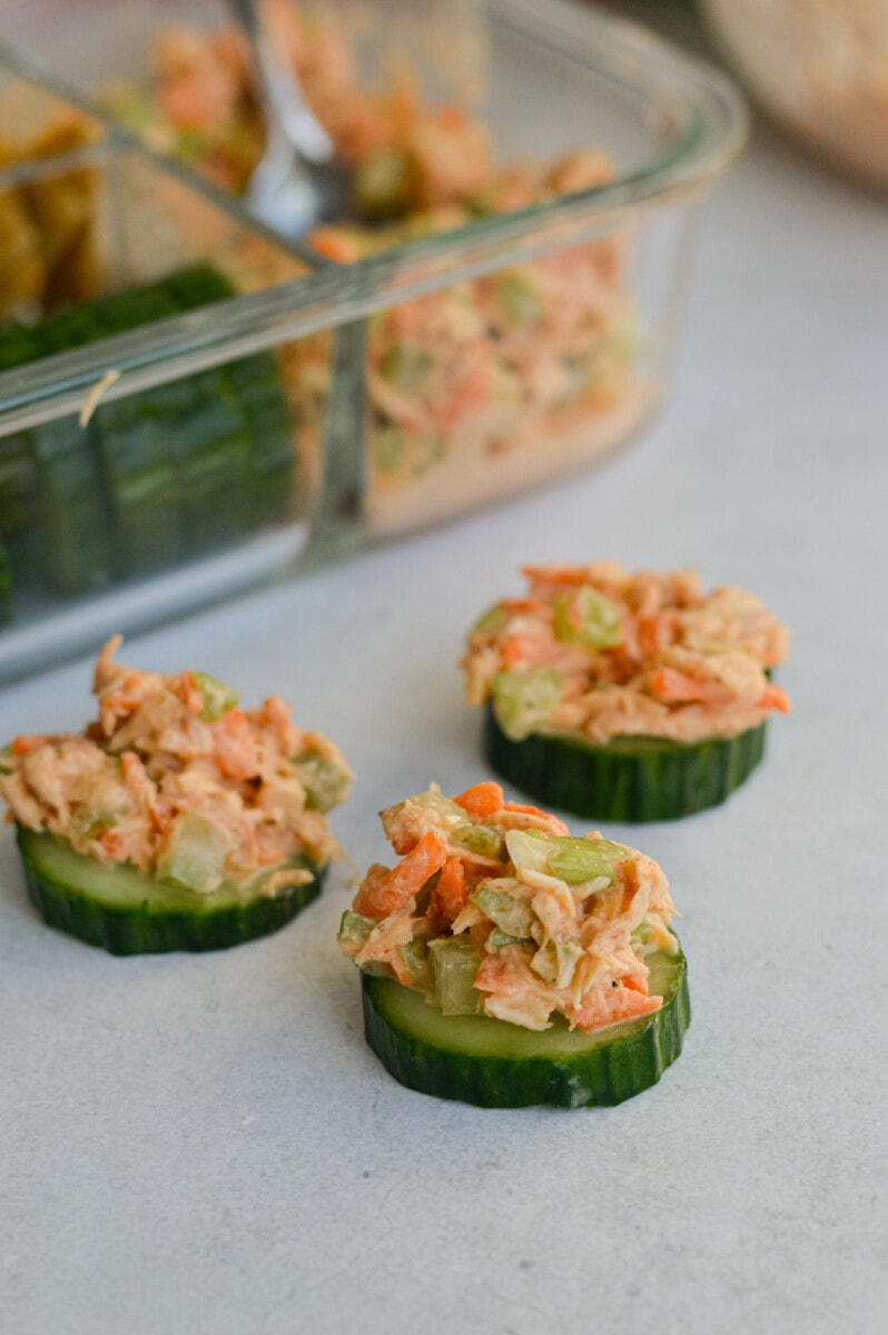 Cucumber slices topped with spicy tuna salad.