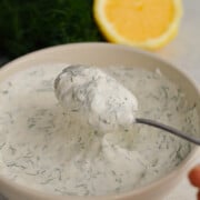 Mixing greek yogurt dill dip until smooth.