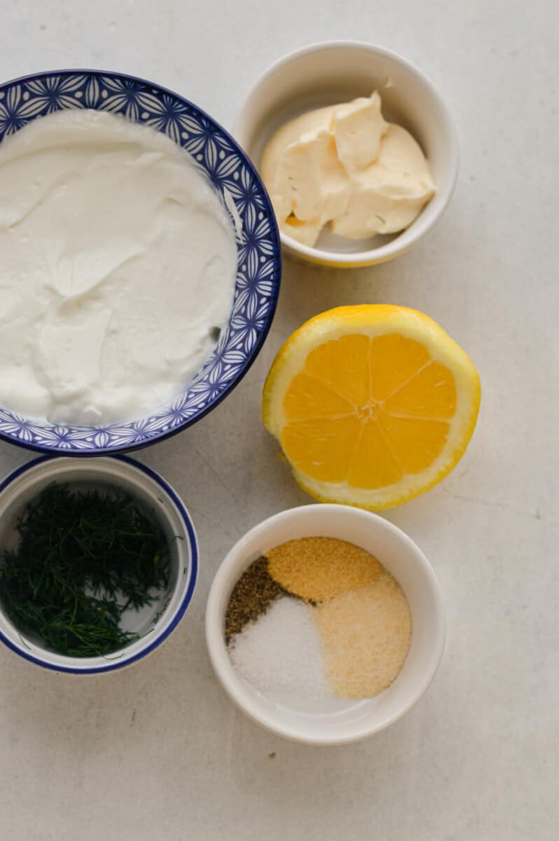 Ingredients including Greek yogurt, mayonnaise, lenon juice, fresh dill and spices.