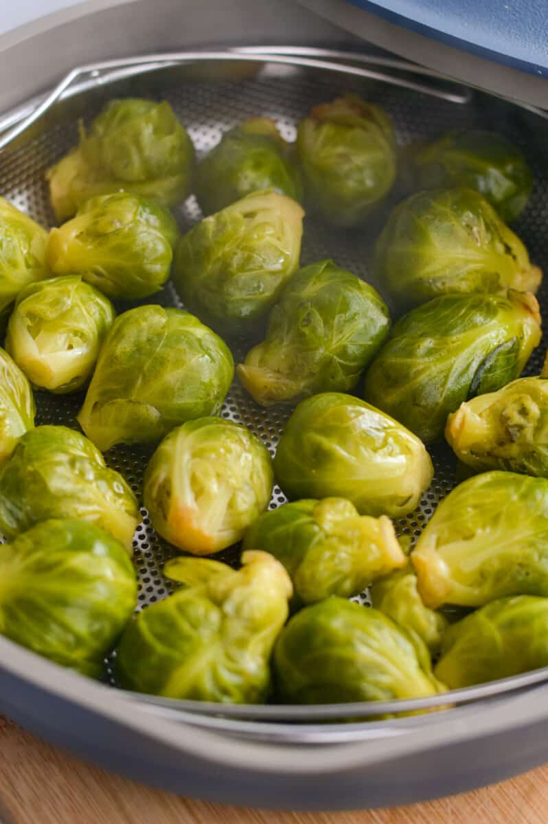 Steaming Brussels sprouts.