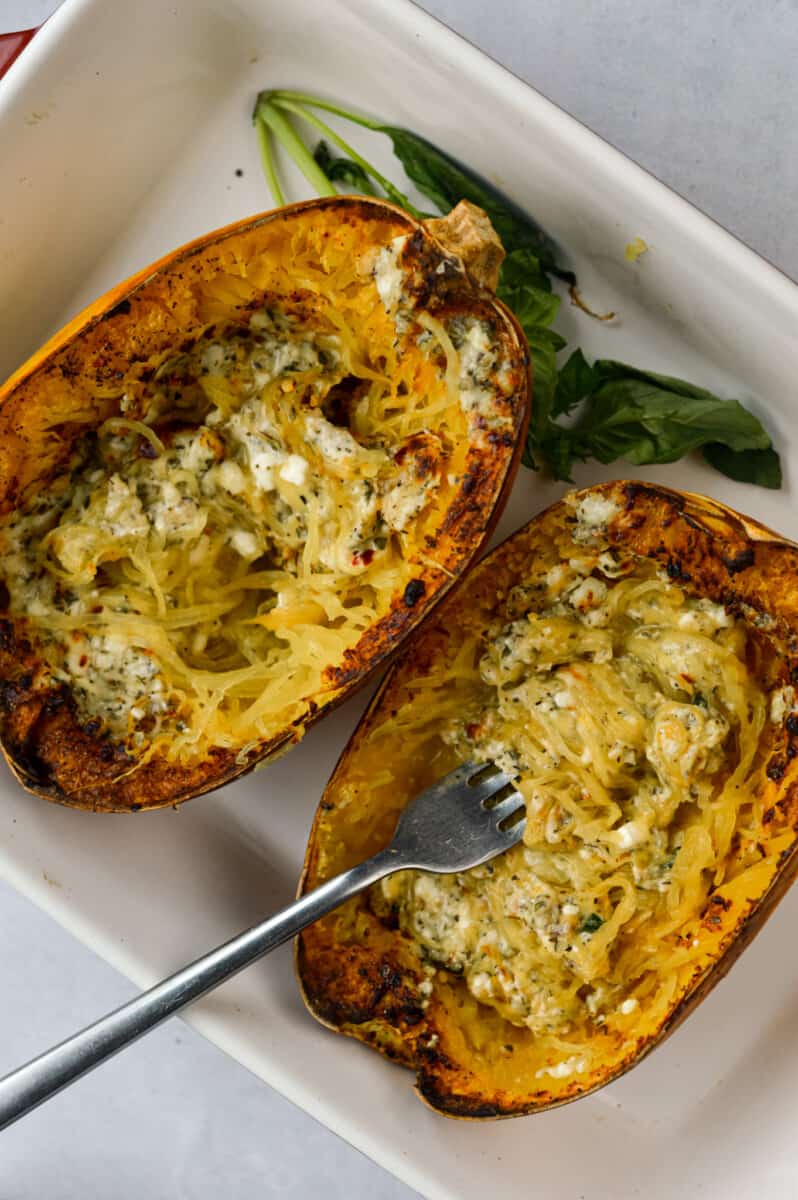Air fryer spaghetti squash with the noodles separated with a fork.