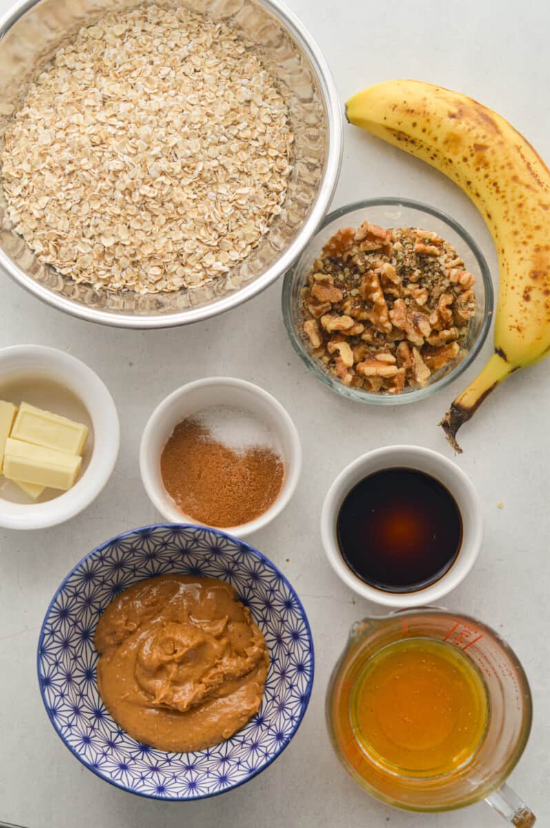Ingredients including oats, banana, nuts, honey, peanut butter, cinnamon, vanilla extract and white chocolate.