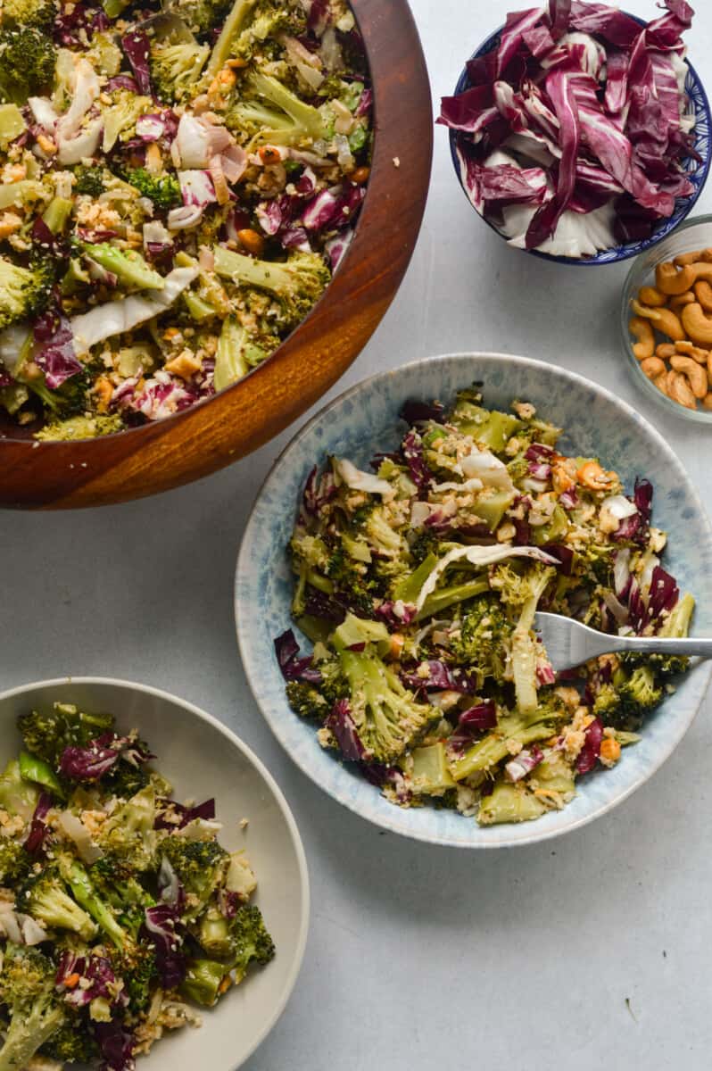 Serving bowls of roasted broccoli salad.