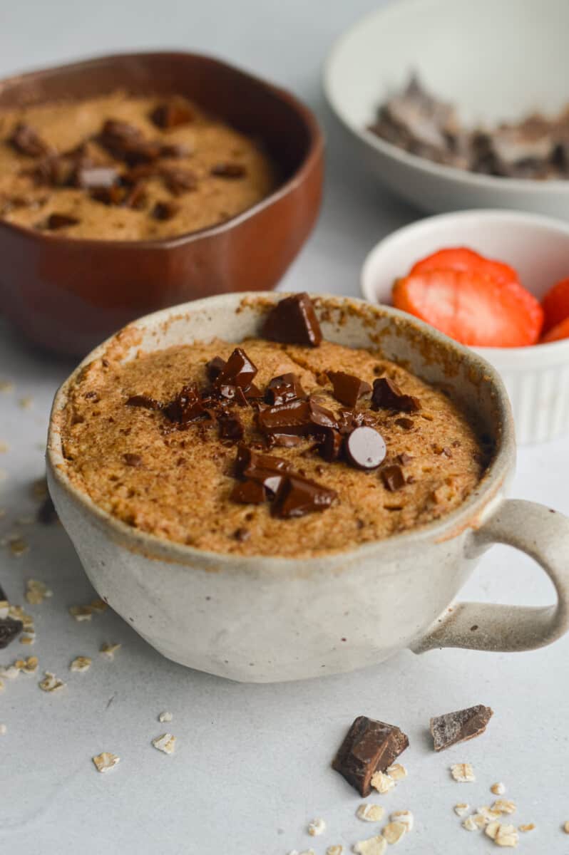 Oatmeal mug cake with chocolate chips.