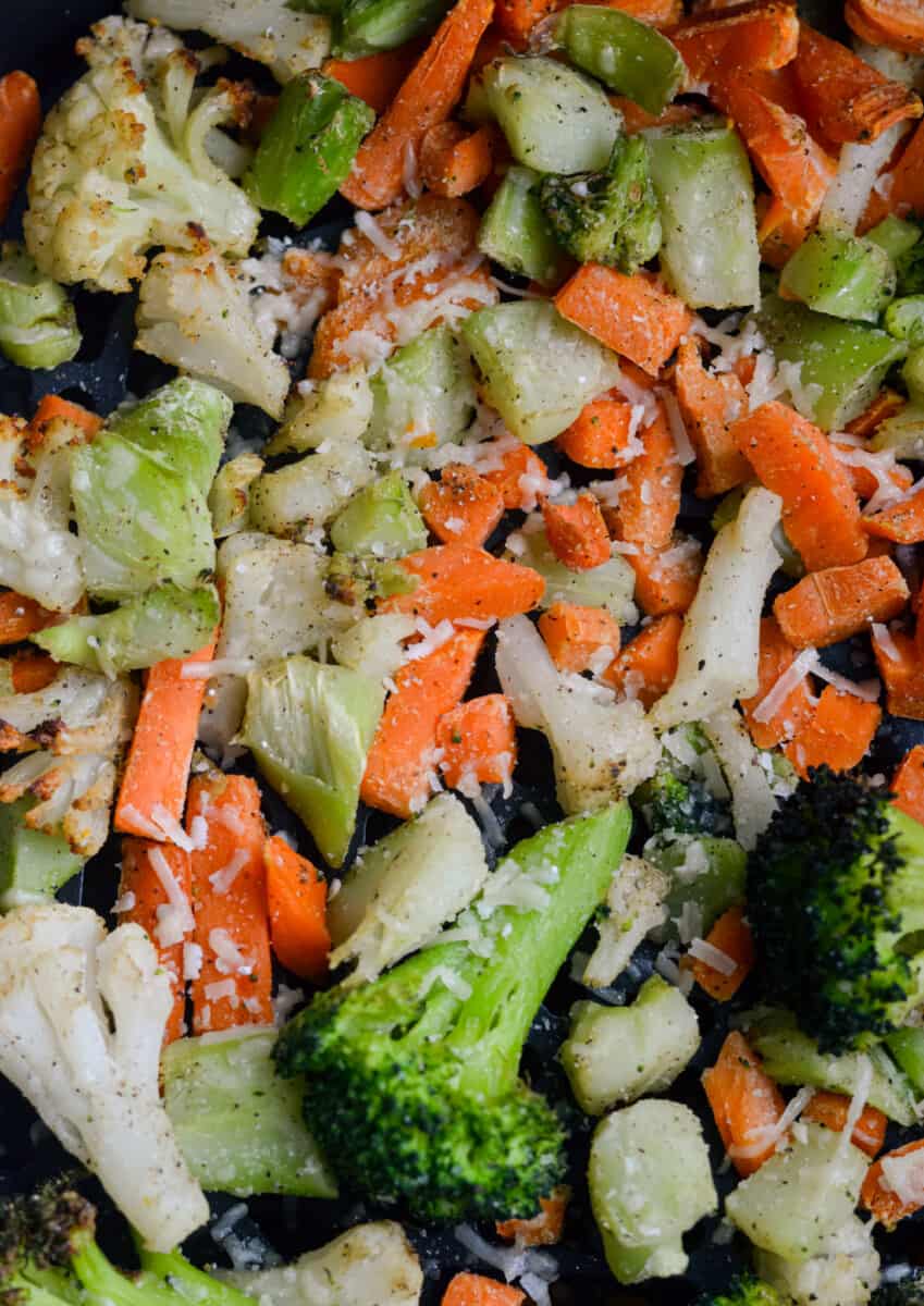 Close up of air fryer frozen vegetables with parmesan.