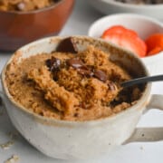 Oatmeal mug cake with chocolate chips.