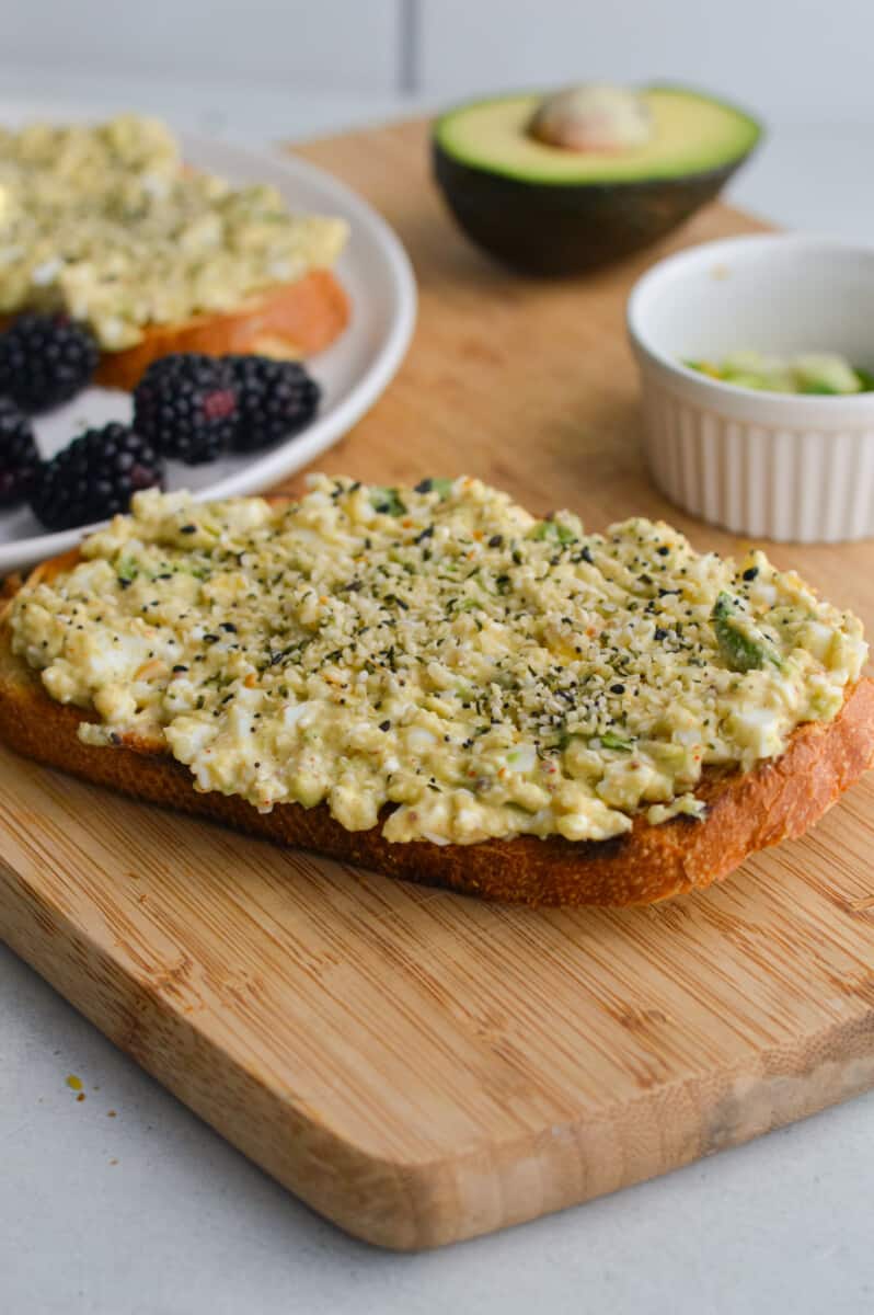 Slice of avocado cottage cheese toast.