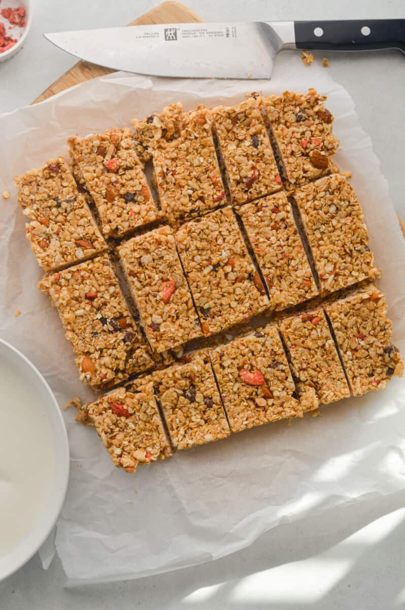 Slicing granola bars into 16 equal pieces.