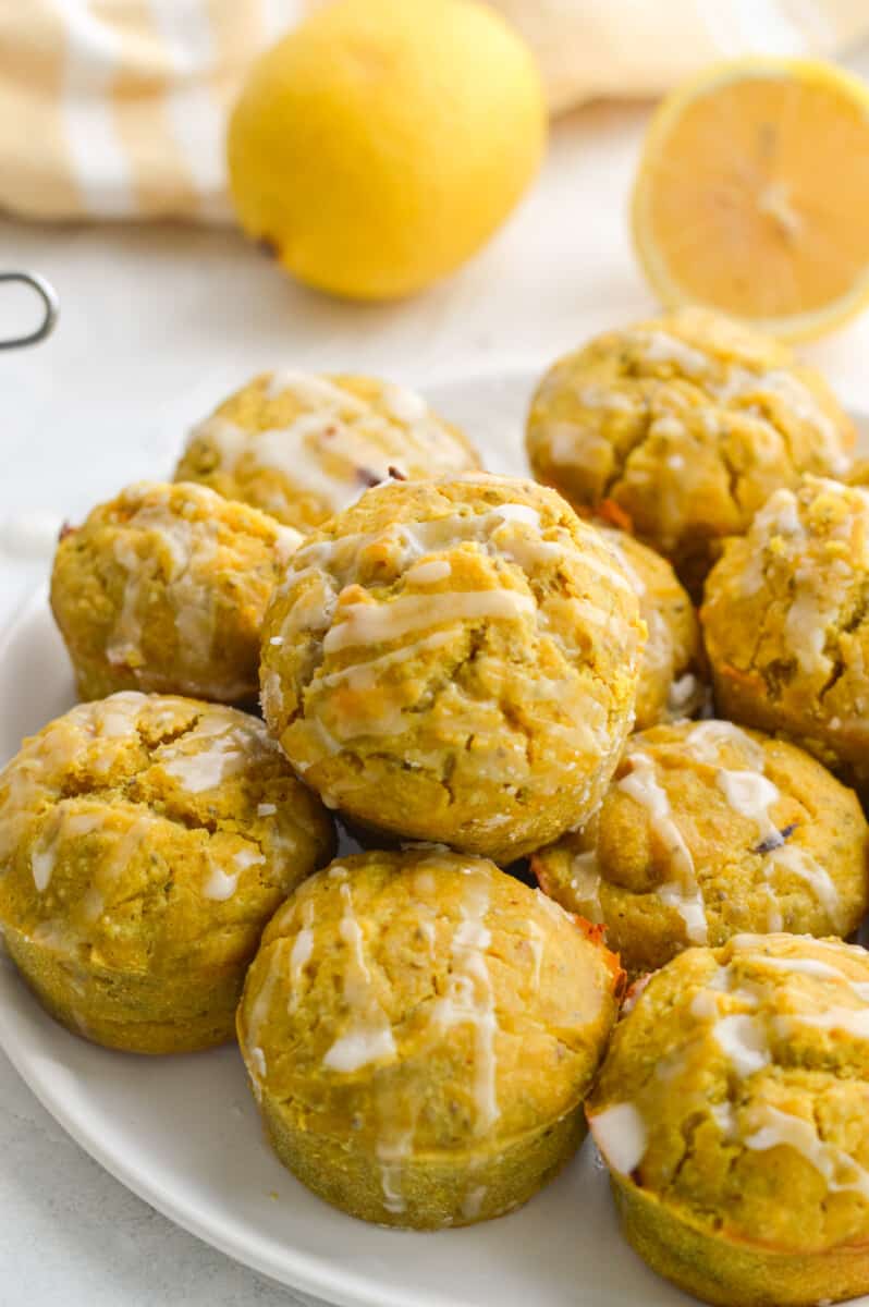 Close up plate of lemon drizzle muffins.
