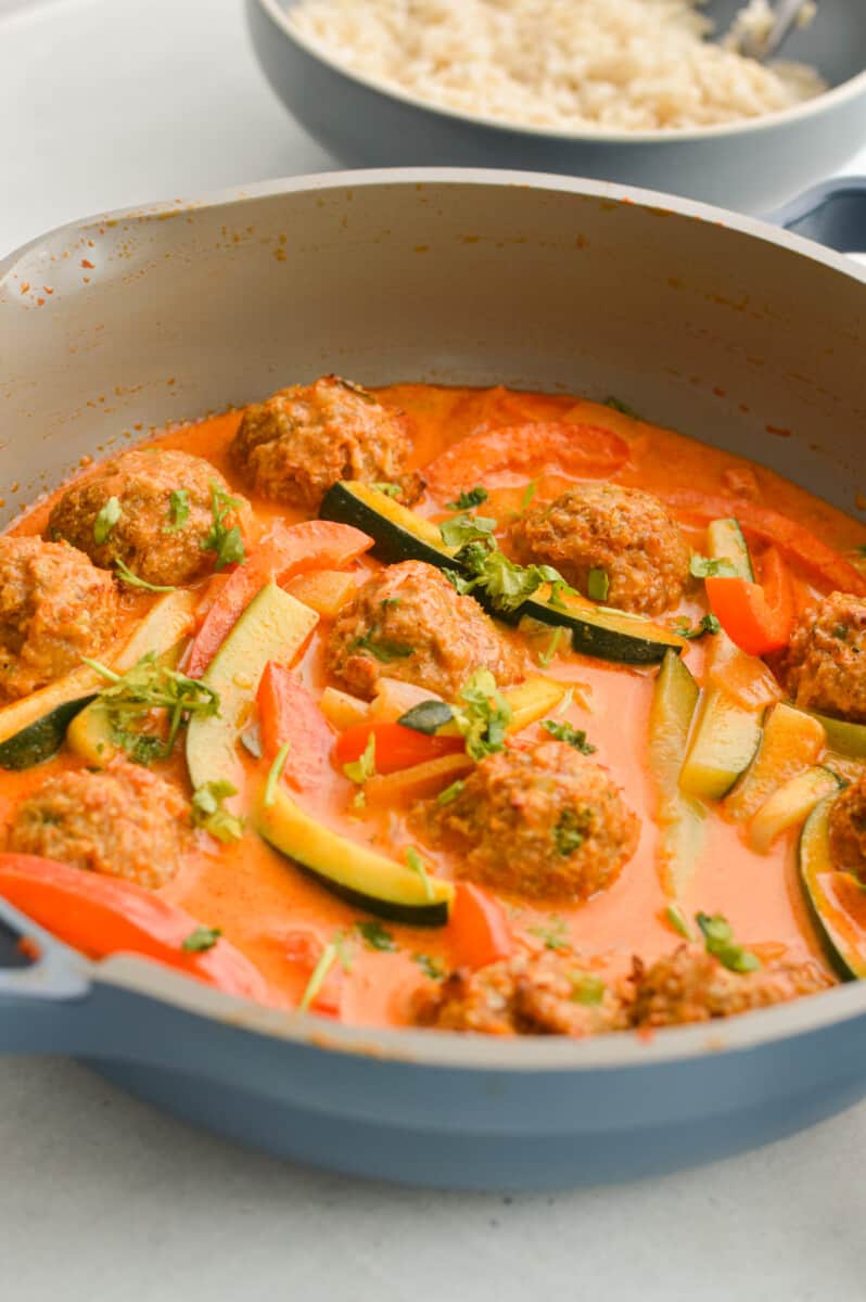 Pan of Thai red meatball curry.