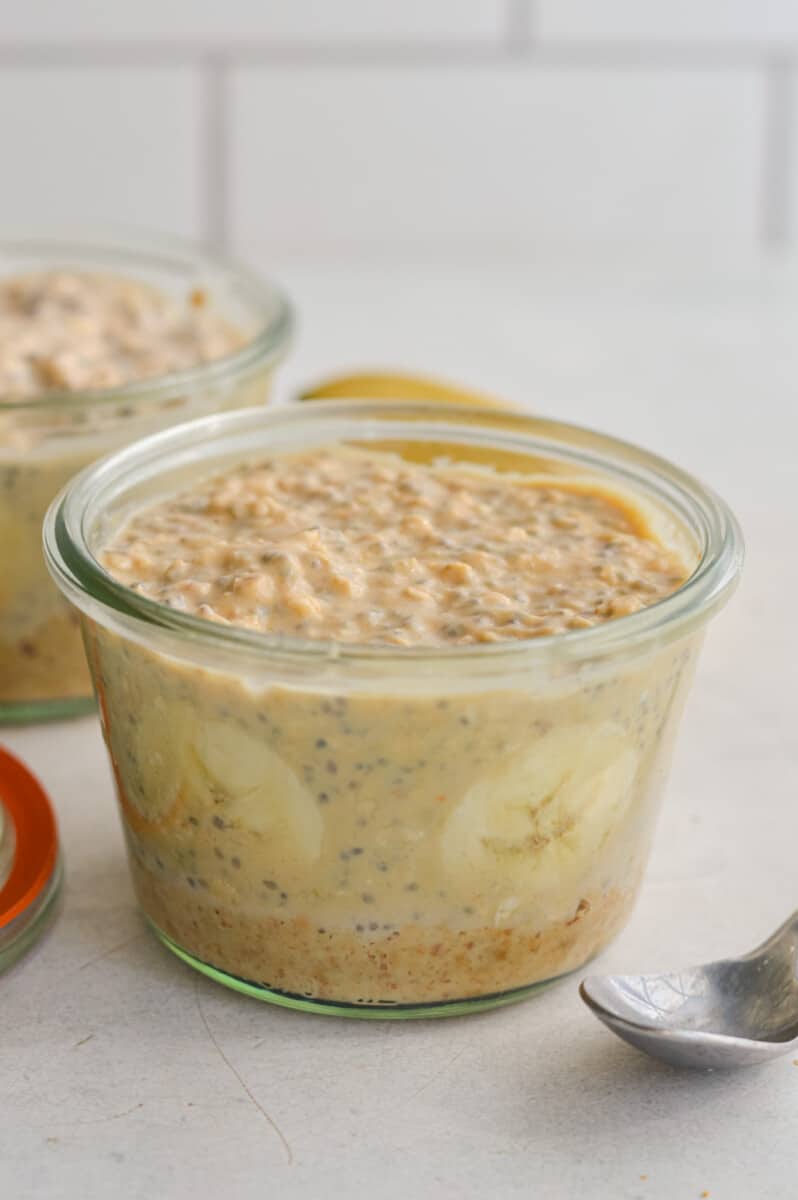 Banana layered in banana overnight oats jar.