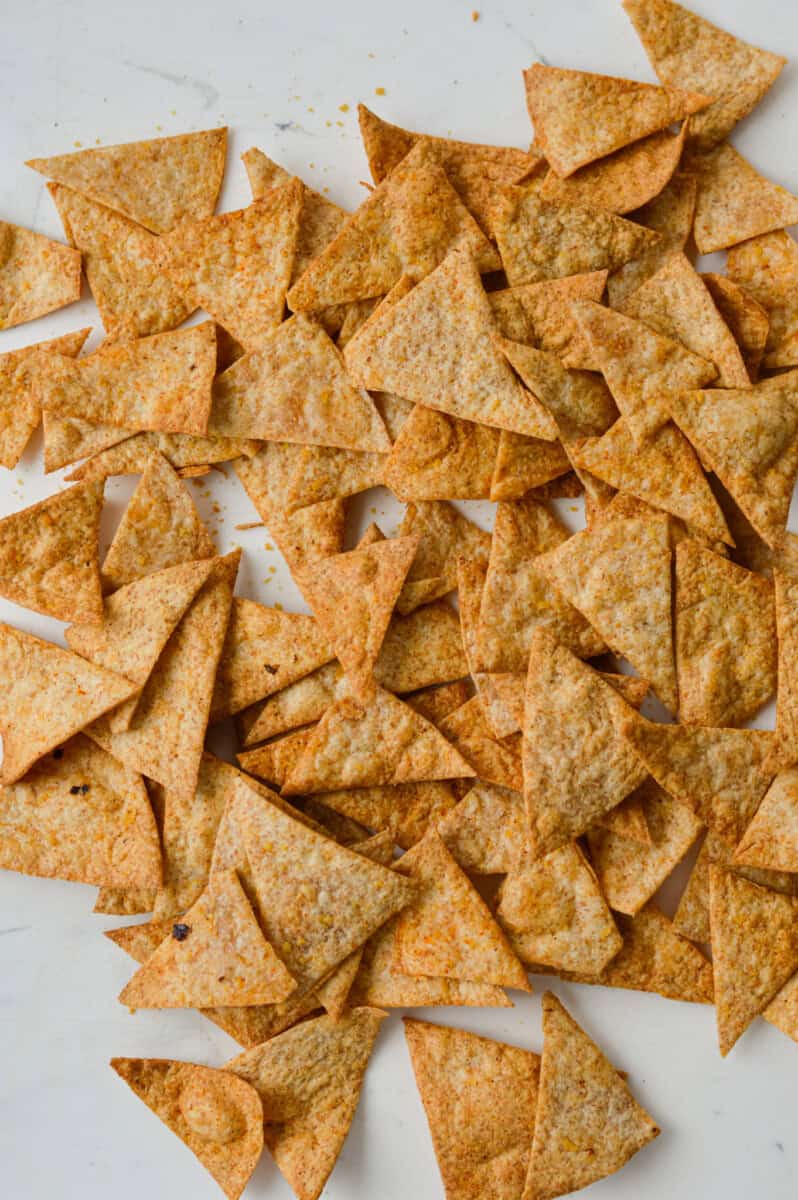 Birds eye of air fryer tortilla chips scattered.