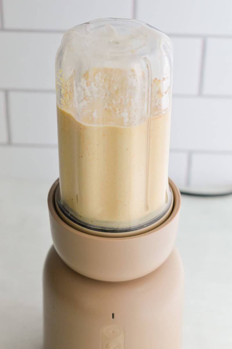 Blending cottage cheese pasta sauce.