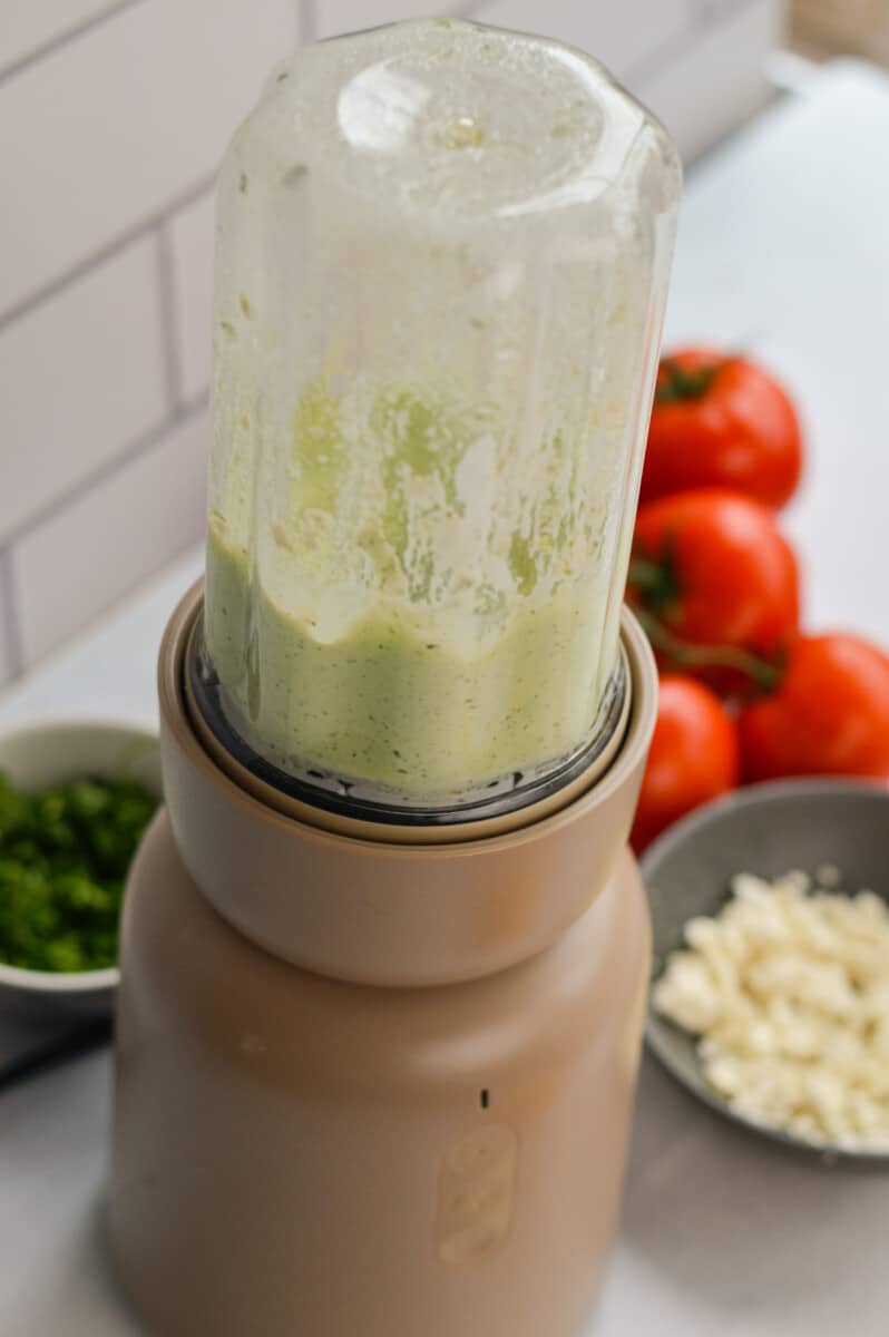 Blending herb whipped feta sauce.
