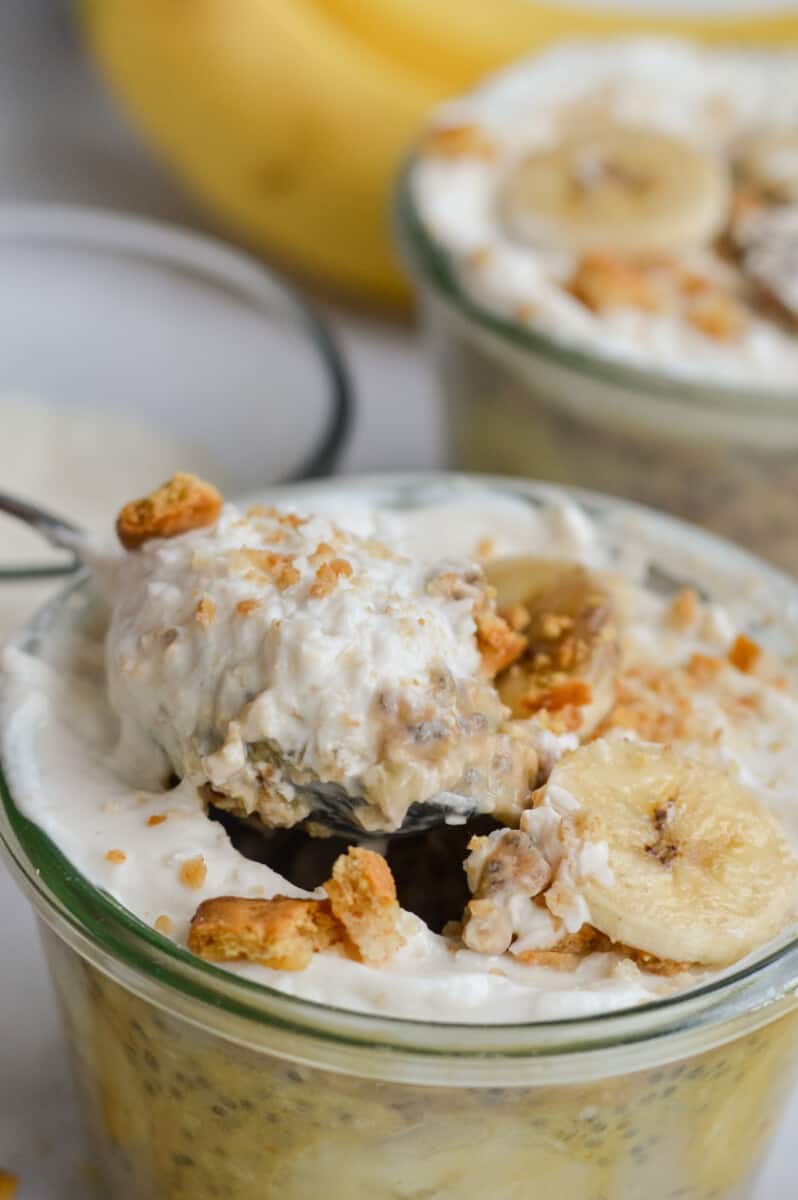 Close up of banana overnight oats with sliced banana and graham cracker crumbs.