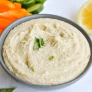 Bowl of lemon and herb white bean dip.