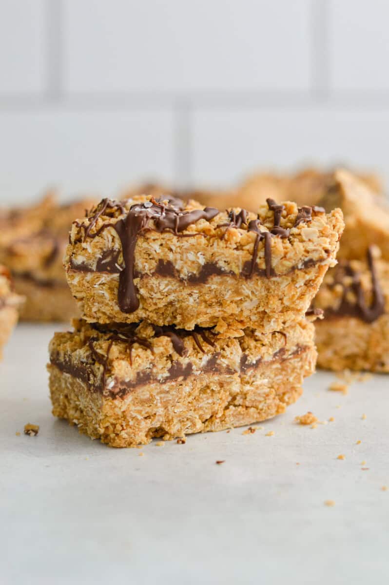 Two stacked chocolate oat bars.