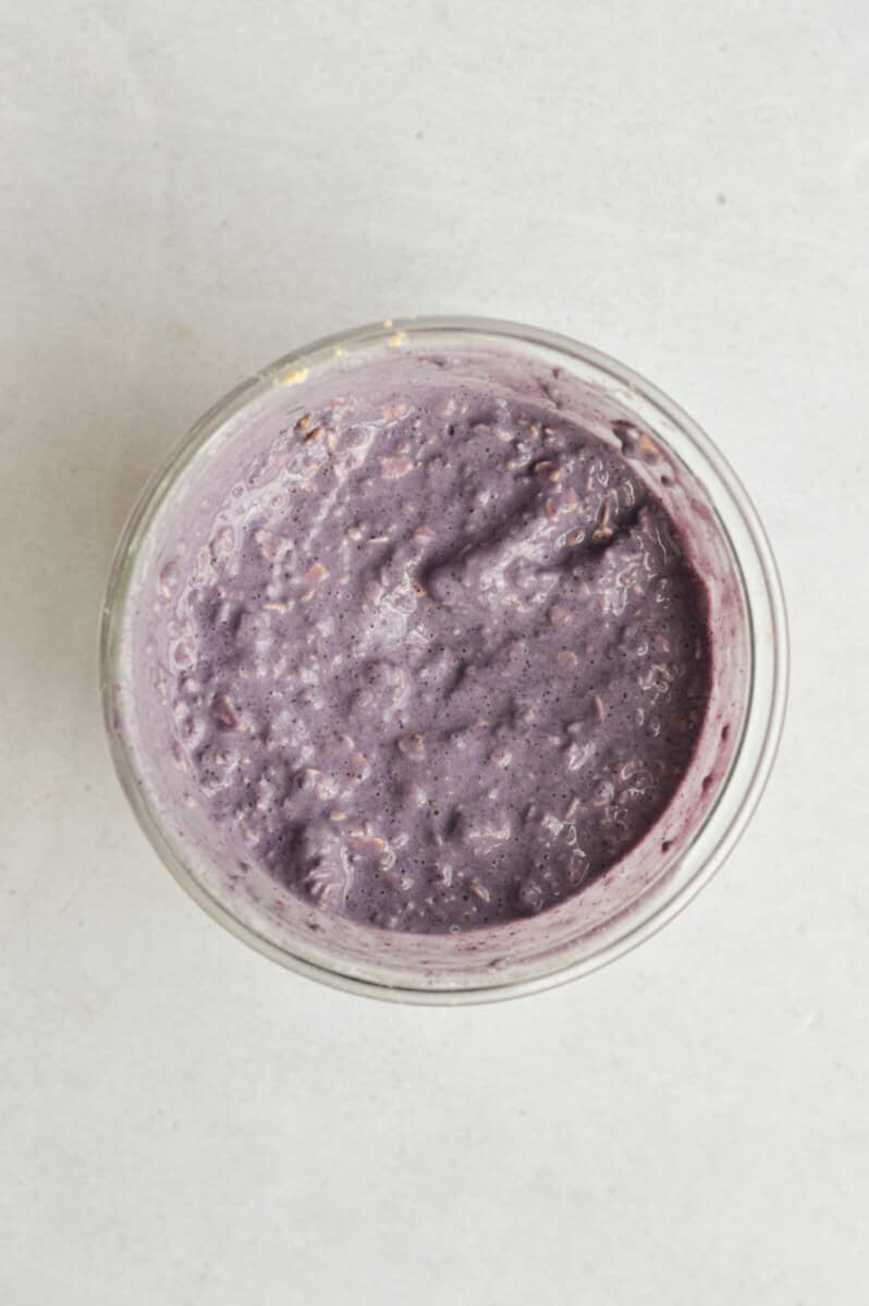 Mixing together blueberry overnight oats.
