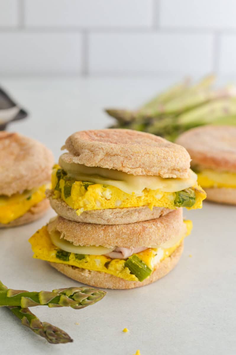 Stack of two egg breakfast sandwiches.