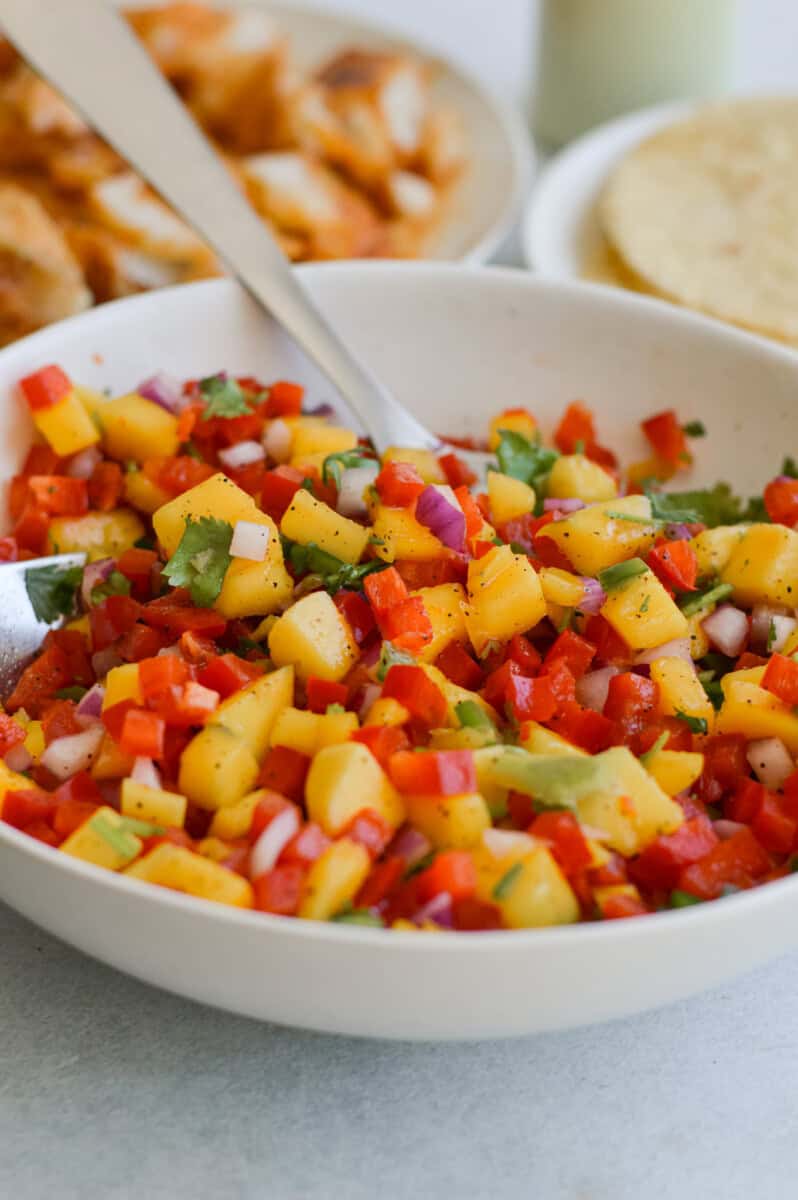Bowl of mango salsa.