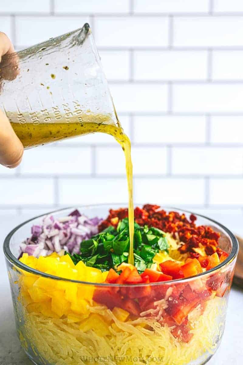 Glass bowl of spaghetti squash salad.