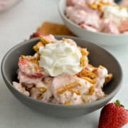 Bowl of strawberry and banana cheesecake salad.