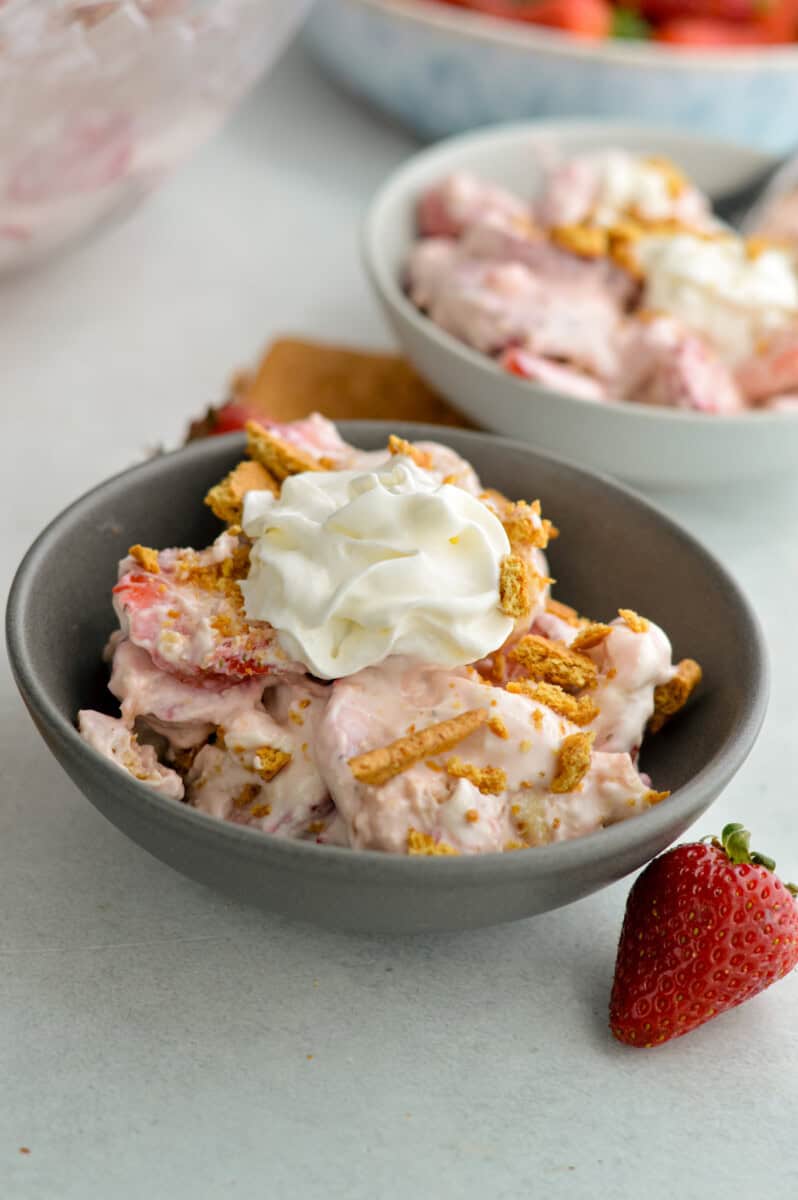 Bowl of strawberry and banana cheesecake salad.