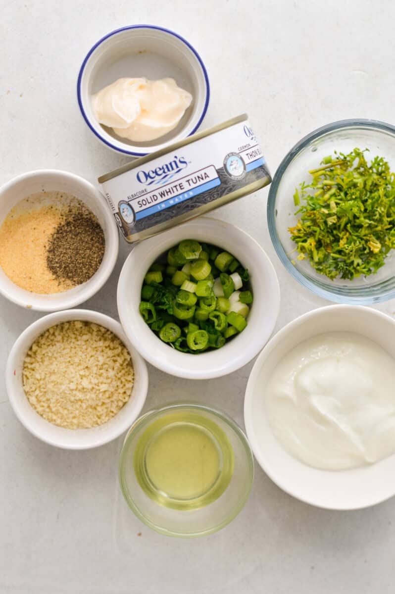 Ingredients including canned tuna, herbs, spices, Greek yogurt, mayonnaise and panko.