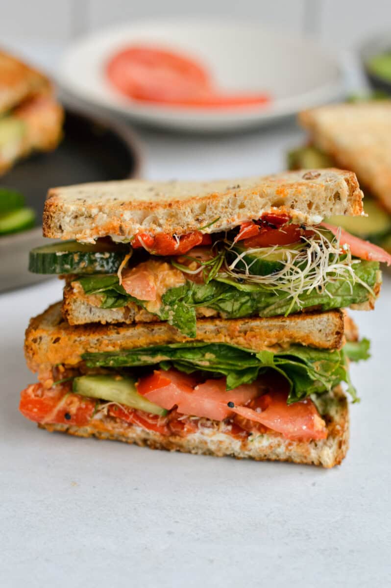 Cross section of a veggie mediterranean sandwich.