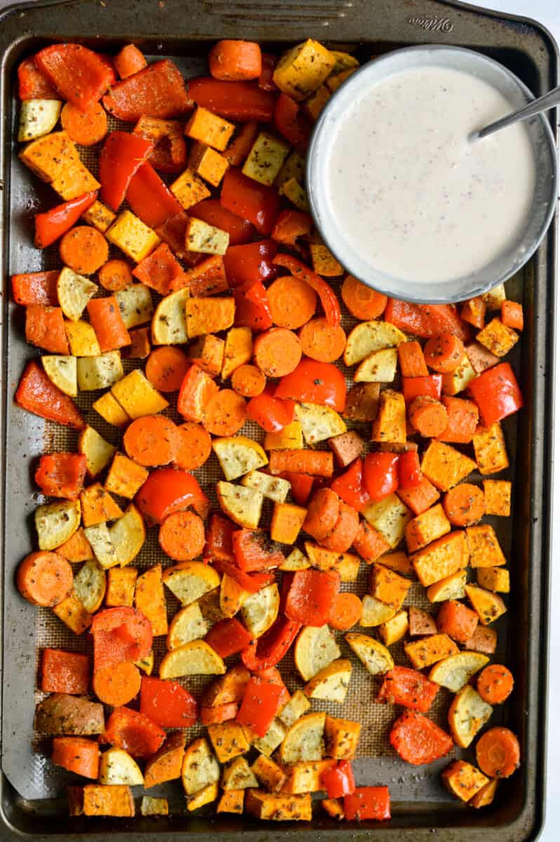 Birds eye of sheet pan roasted vegetables and honey mustard sauce.