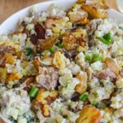 Close up of smashed potato salad.