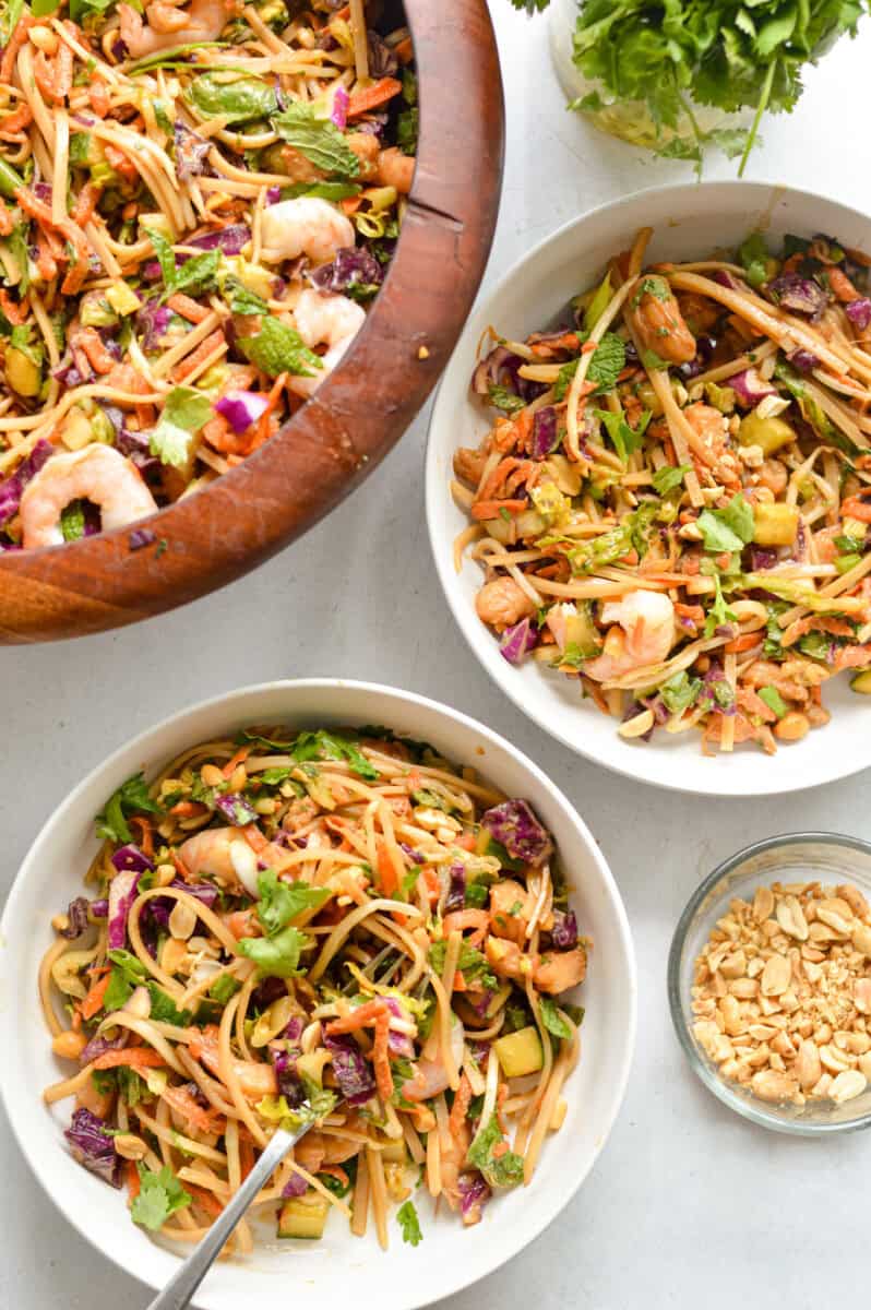 Serving bowls of fresh spring roll salad. 