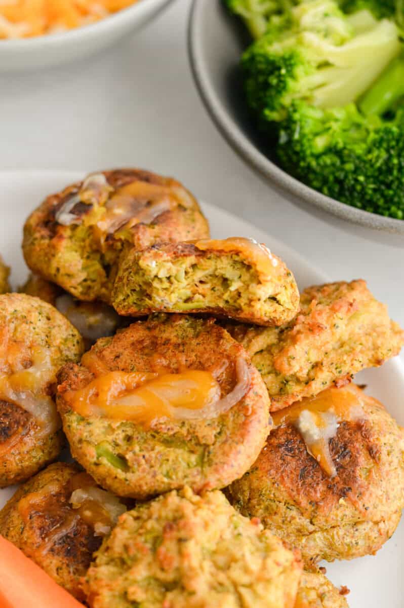 Plate of cheesy broccoli bites.