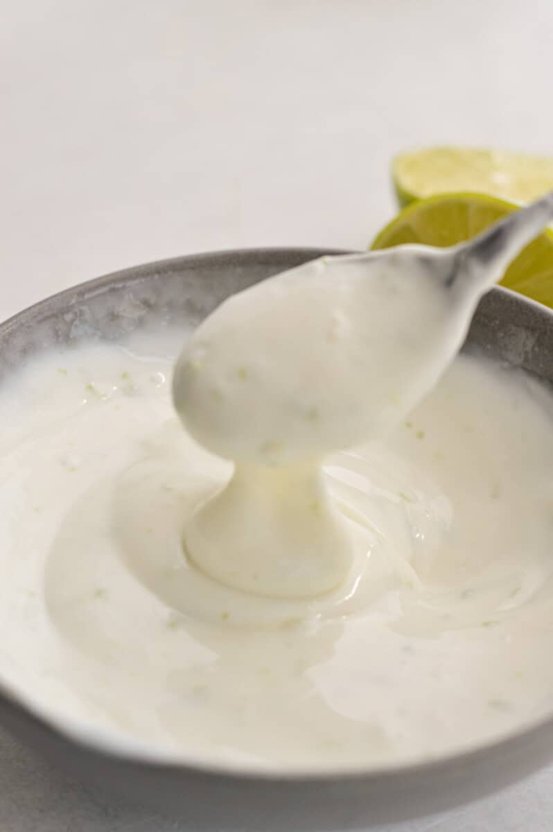 Mixing together yogurt topping.