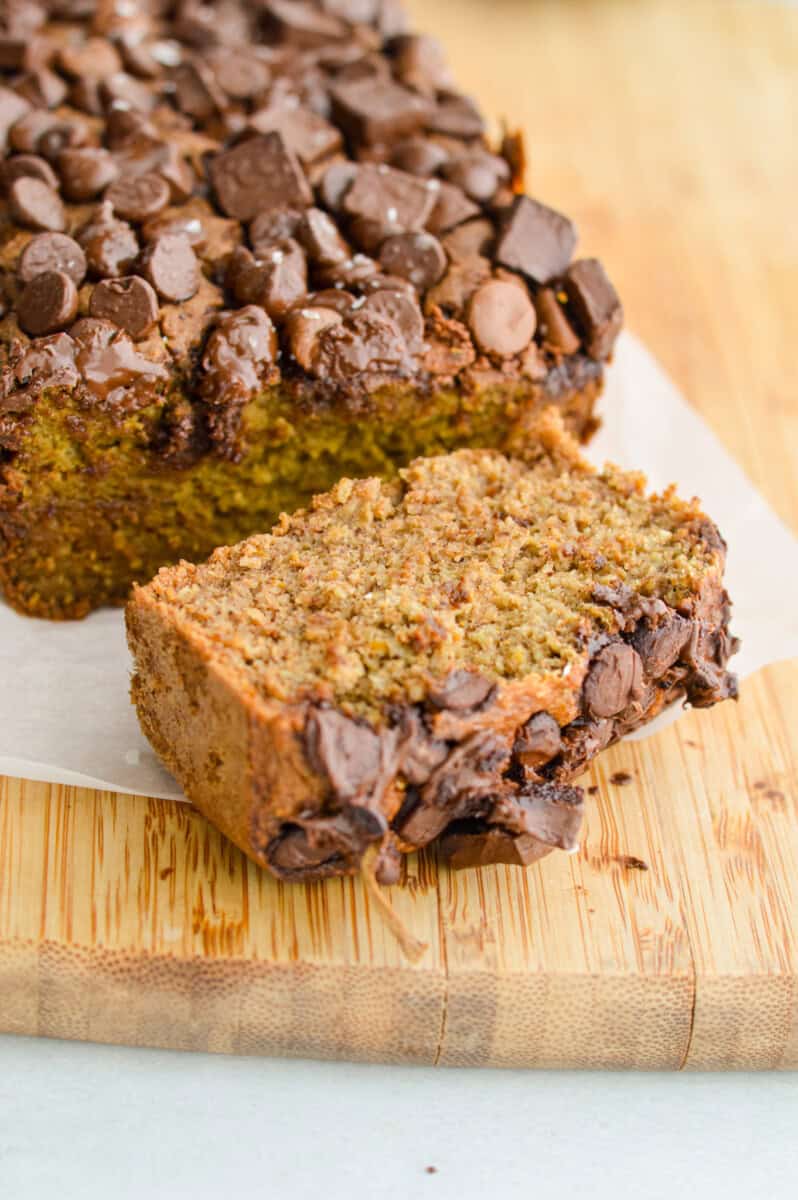 Close up of a slice of chocolate chip zucchini loaf.