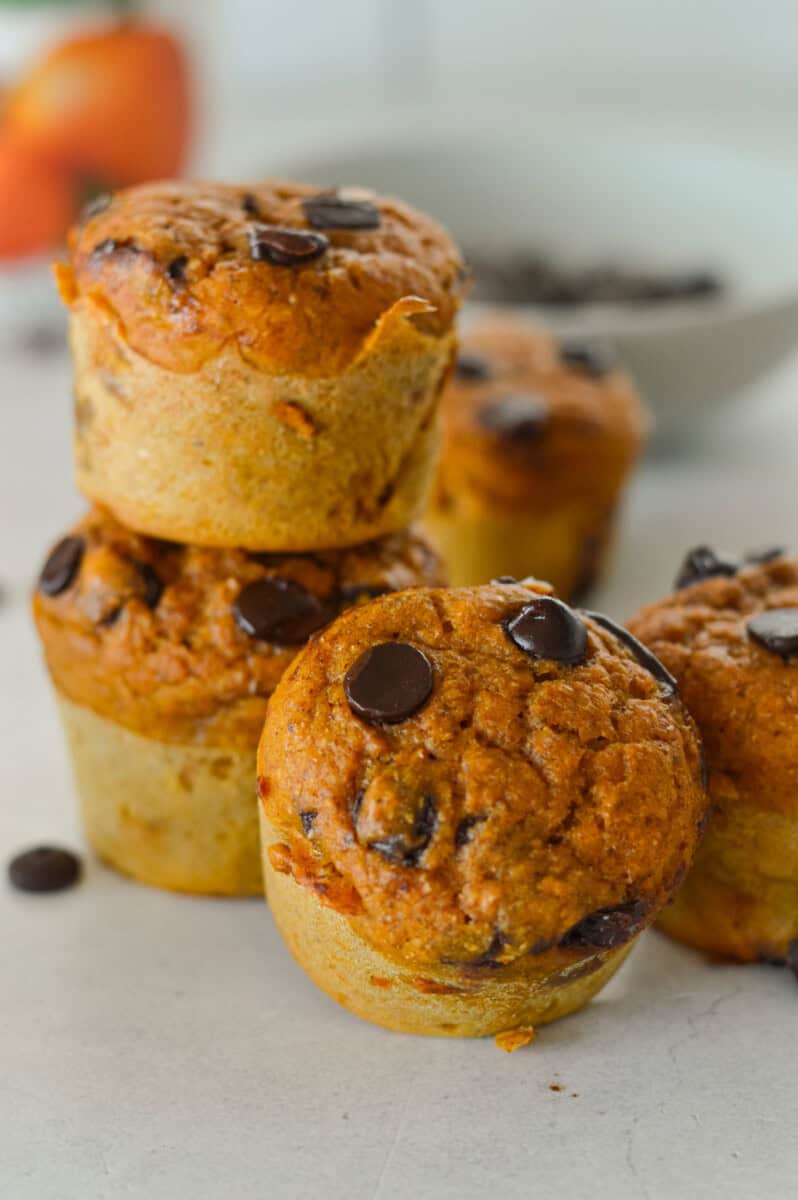Stack of pumpkin protein muffins.