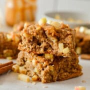 Two stacked apple oat bars.