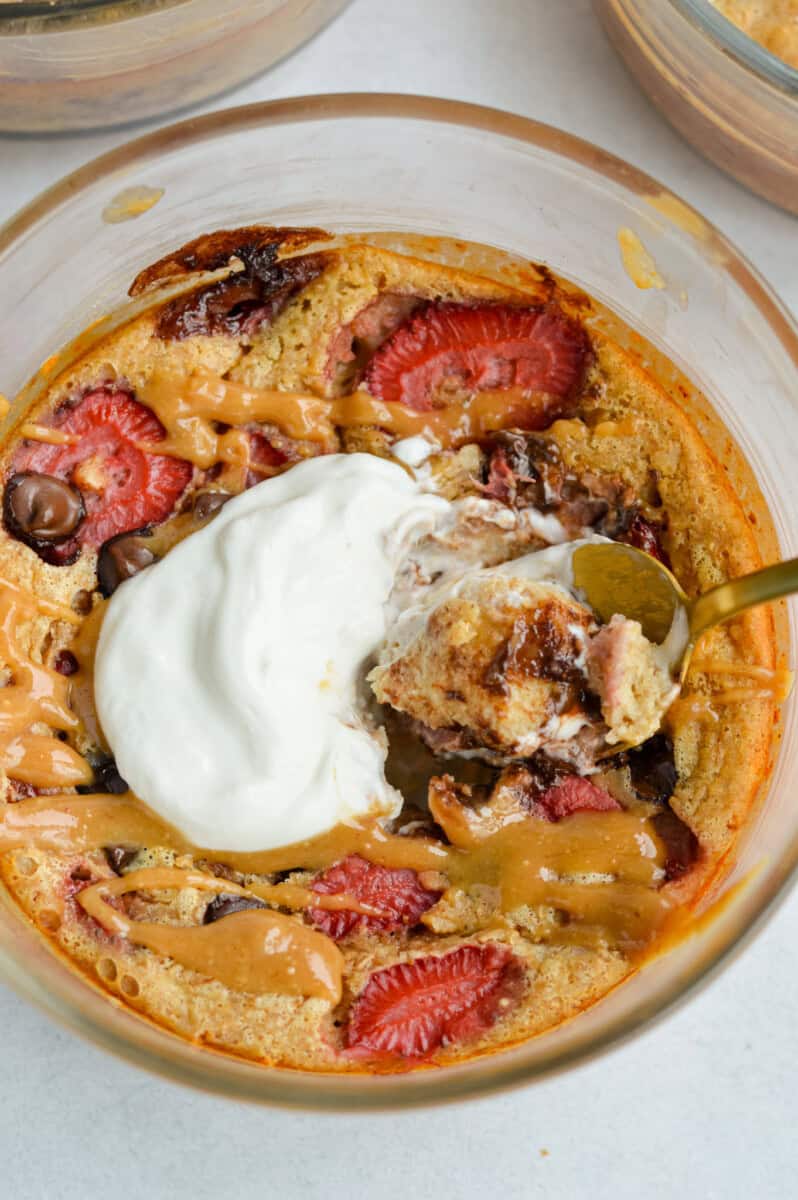Birds eye of strawberry pancake bowl topped with greek yogurt.